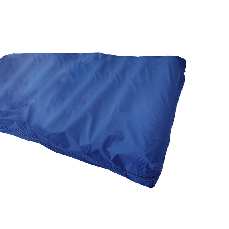 Siliconized hollow fiber mattress with foam base and rubberized cover